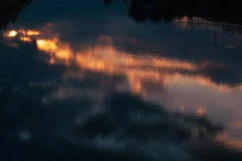 Sunset Reflection on Water Surface 스톡 사진