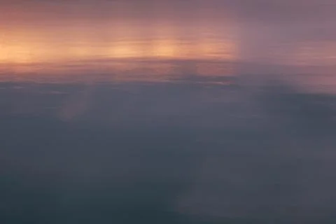 Sunset reflection on water surface 스톡 사진