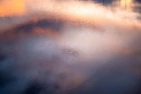 Sunset Reflection on Water Surface 스톡 사진