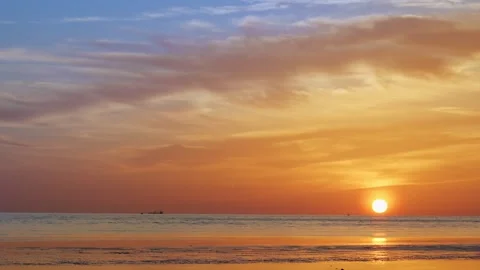 Sunset Reflections and Gentle Ripples Coastal Horizon with Distant Boats Stock Footage 312920334