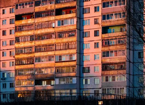 Sunset Reflections on Apartment Building Stock Photos