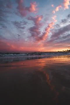 Sunset Reflections at the Beach Stock Photos