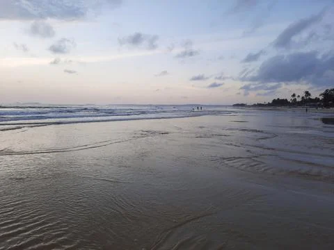 Sunset reflections on the beach. sky reflections on the water. Stock Photos