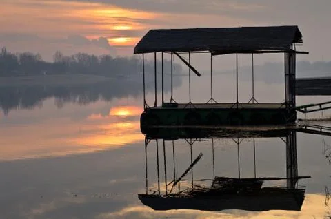 Sunset reflections on a lake at Ada river island in Belgrade Stock Photos