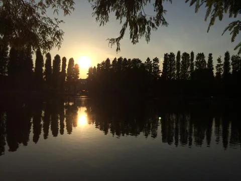 Sunset Reflections In Lake Stock Photos