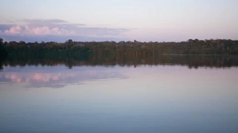 Sunset reflections on Lake Sandoval, Peru Stock Footage 153090626