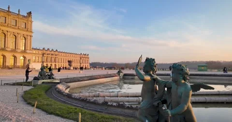Sunset Reflections on Ornamental Pool in the Gardens of Versailles Stock Footage 345110360