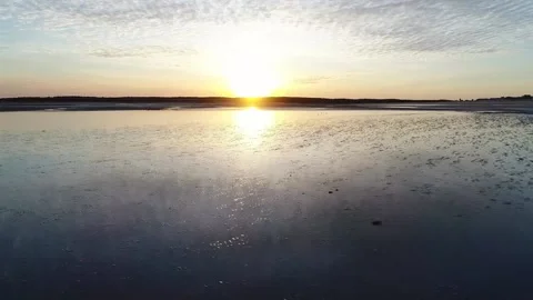 Sunset reflections over sand ripples 2 Stock Footage 158835776