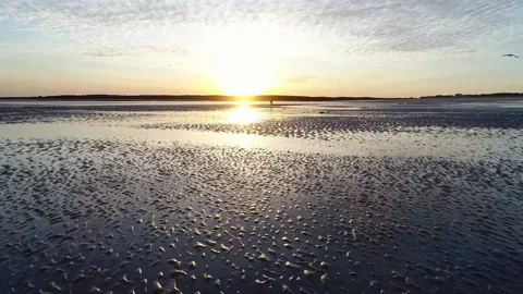 Sunset reflections over sand ripples Stock Footage 158835815