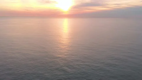 Sunset Reflections on the Pacific Ocean, California, Aerial Tilt, 4K Stock Footage 147911265