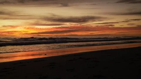 Sunset reflections on a Perth beach in Western Australia 6K Stock Footage 311691327