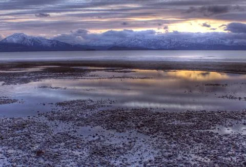 Sunset with reflections Stock Photos