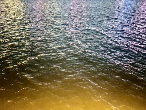 Sunset Reflections on Rippling Water Stock Photos