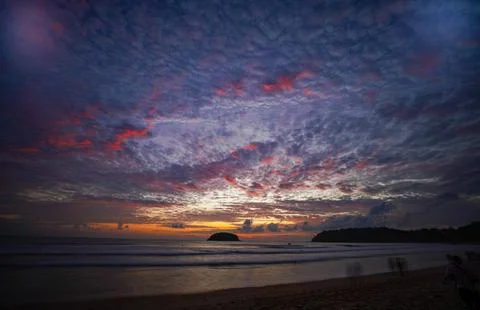 Sunset Reflections on a Tropical Coastline Stock-Fotos
