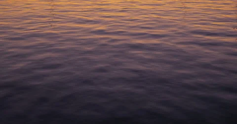 Sunset reflections in the water - 4K (UltraHD) Stock Footage 39746229