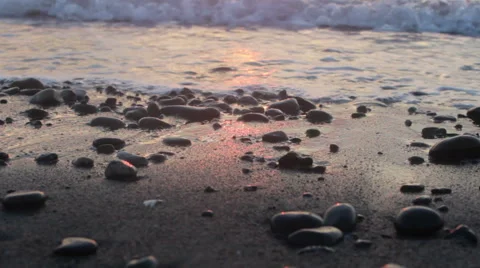 Sunset Reflects Off Of Waves On The Beach Stock Footage 54213410