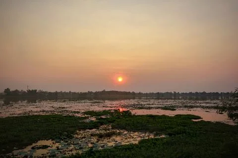 Sunset in the reservoir Stock Photos