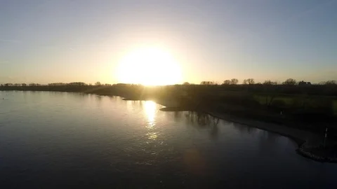 Sunset at the Rhine in Meerbusch with a Container Ship - Time lapse Stock Footage