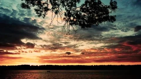 Sunset on the river above the forest on a summer evening. Paints. Color. Stock Footage 158382474