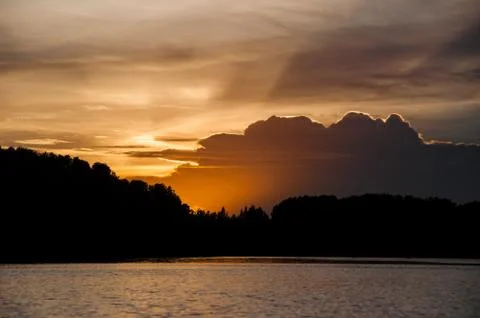 Sunset river and cloud Stock Photos