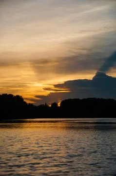 Sunset river and cloud Stock Photos