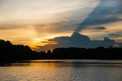 Sunset river and cloud Stock Photos