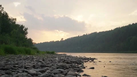 Sunset on the river bank timelapse Stock Footage 166372040