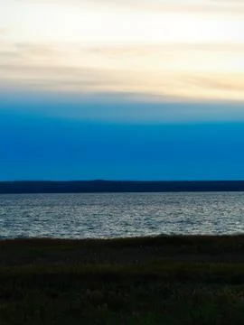 Sunset on river beach landscape backdrop Foto stock