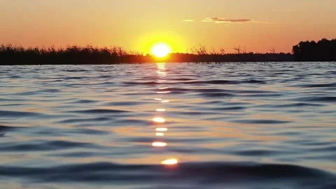 Sunset on the river. A beautiful time. Stock Footage 233578192