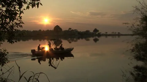 Sunset at River with Boat passing by 库存影片 10872445