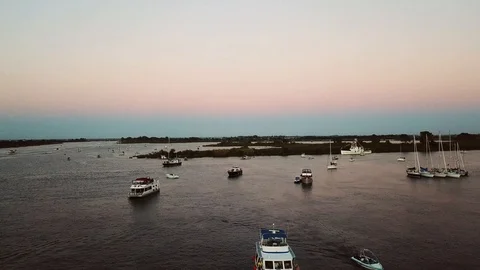 Sunset River with Boats Drone Stock Footage 99565567