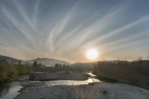 Sunset on the river. the clear blue sky. Stock Photos