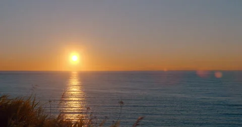 Sunset at the river with clear sky / Time lapse / Matane Stock Footage 130923949