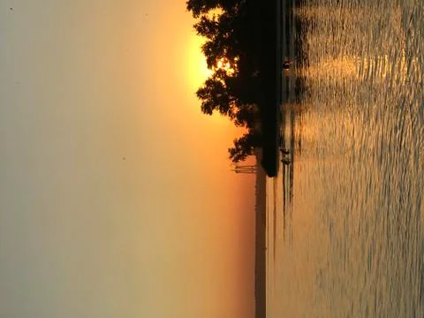 Sunset on the river evening summer Stock Photos