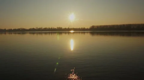 Sunset river flying low in to the sun Stock Footage 46913360