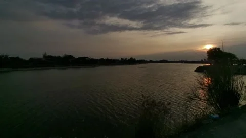 Sunset by the river Video stock 217675364
