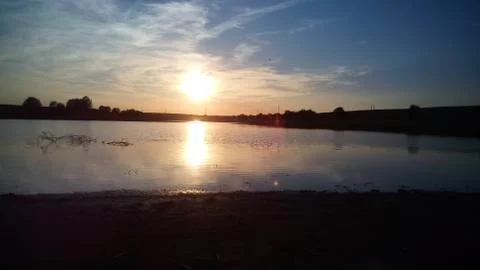 Sunset river landscape Stock Photos