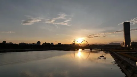 A sunset river with the mountain and trees Video stock 303550891