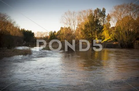 Sunset river Stock Photos