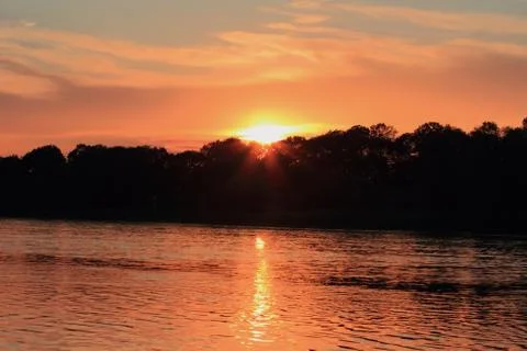 Sunset on the river Stock Photos