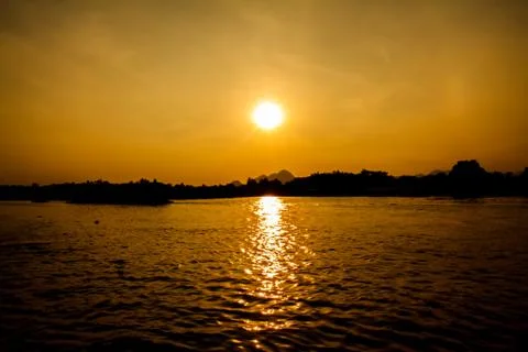 Sunset on the river Photos