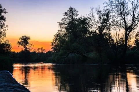 Sunset on the river Stock Photos