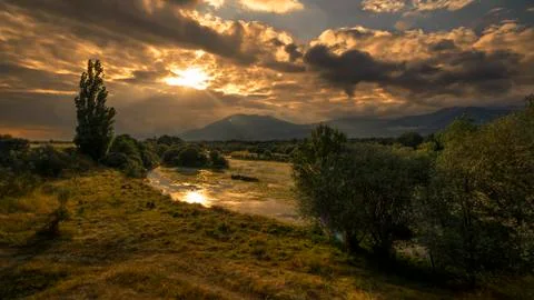 Sunset river Stock Photos