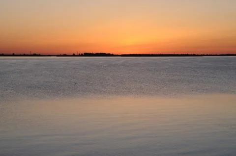 Sunset on a river Stock Photos