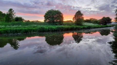 Sunset by the river Stock Photos