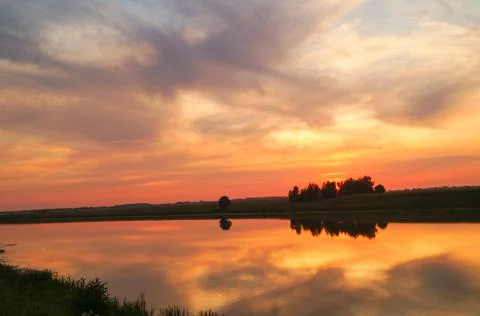 Sunset in the river with reflex Stock Photos