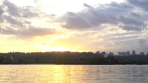 Sunset on the river with ships in time lapse. Stock Footage 196078392