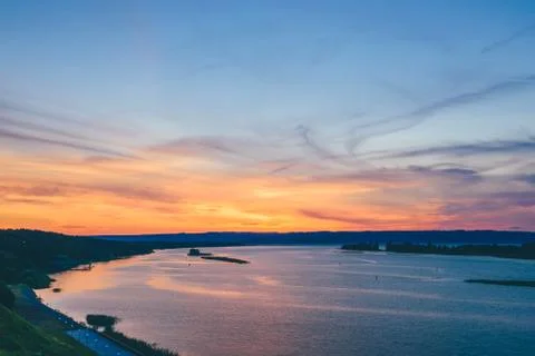 Sunset on river shore. Stock Photos