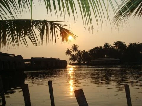Sunset in River side with Reflection on water Coconut tree area Stock-Fotos