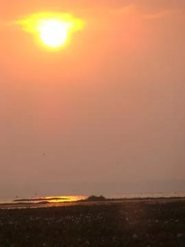 Sunset in River side with Reflection on water beautiful natural beauty Stock-Fotos